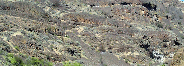  Rock faces where Sunset Creek enters the Columbia River canyon. Typical topography where rockshelters and storage sites are situated