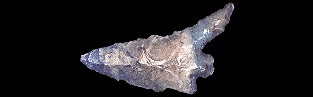 45KT28. One of six basalt points found by a collector digging in the beach at the north end of the site.