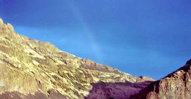 45KT28. Rainbow high above Sunset Creek Canyon.