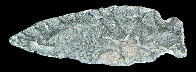 45KT28. One of six basalt points found by a collector digging in the beach at the north end of the site.