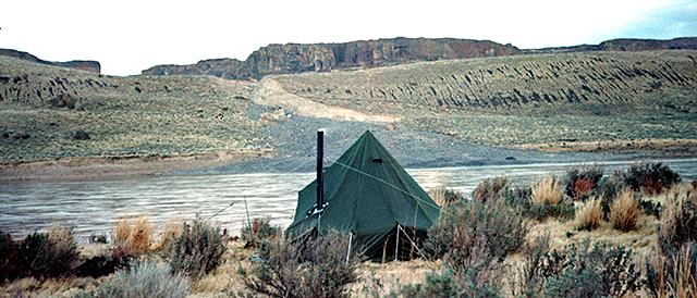 45KT28. March 1959. Our camp looking across at the Pot Holes about an hour after sunrise. House Pit 15 is just to the left.