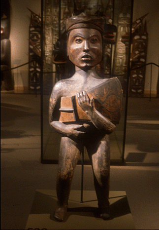 COMMEMORATIVE STATUE OF MAN WITH COPPER.